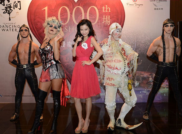 Hong Kong-based singer and actress Angelababy with some of the cast from “The House of Dancing Water”