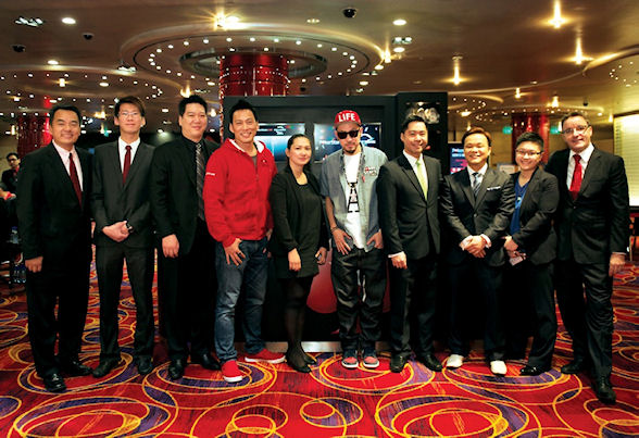 The PokerStars Macau team with Taiwanese celebrity Alex and hip hop star MC HotDog
