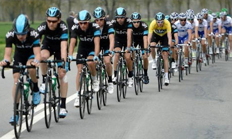 Last year's winner Chris Froome is helped along by his Sky teammates
