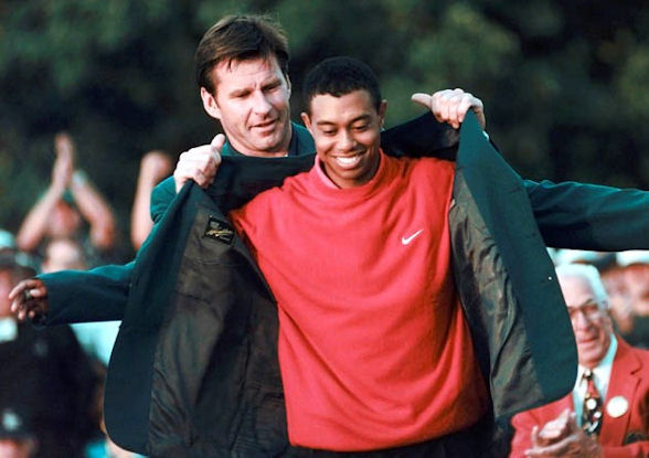 Woods wins his first major at the US Masters in 1997